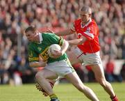 23 June 2002; Tomás î SŽ of Kerry in action against Cork's Brendan Ger O'Sullivan during the Bank of Ireland Munster Senior Football Championship Semi-Final Replay match between Cork and Kerry at Páirc U’ Chaoimh in Cork. Photo by Brendan Moran/Sportsfile