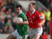 23 June 2002; Michael McCarthy of Kerry in action against Cork's Philip Clifford during the Bank of Ireland Munster Senior Football Championship Semi-Final Replay match between Cork and Kerry at Páirc U’ Chaoimh in Cork. Photo by Brendan Moran/Sportsfile