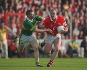 23 June 2002; Brendan Ger O'Sullivan of Cork in action against Tomás î SŽ of Kerry during the Bank of Ireland Munster Senior Football Championship Semi-Final Replay match between Cork and Kerry at Páirc U’ Chaoimh in Cork. Photo by Brendan Moran/Sportsfile