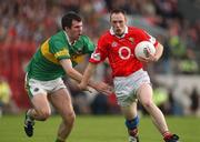 23 June 2002; Philip Clifford of Cork in action against Michael McCarthy of Kerry during the Bank of Ireland Munster Senior Football Championship Semi-Final Replay match between Cork and Kerry at Páirc U’ Chaoimh in Cork. Photo by Brendan Moran/Sportsfile