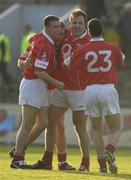 23 June 2002; Cork players, from left, Joe Kavanagh, Diarmuid O'Sullivan, Colin Corkery and Colin Crowley celebrate at the final whistle following their side's victory during the Bank of Ireland Munster Senior Football Championship Semi-Final Replay match between Cork and Kerry at Páirc U’ Chaoimh in Cork. Photo by Brendan Moran/Sportsfile