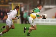 22 June 2002; Pascal Kellaghan of Offaly in action against Brian Lacey of Kildare during the Bank of Ireland Leinster Senior Football Championship Semi-Final Replay match between Kildare and Offaly at Nowlan Park in Kilkenny. Photo by Damien Eagers/Sportsfile