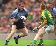 23 June 2002; Coman Goggins of Dublin in action against Ray Magee of Meath during the Bank of Ireland Leinster Senior Football Championship Semi-Final match between Dublin and Meath at Croke Park in Dublin. Photo by Ray McManus/Sportsfile