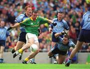 23 June 2002; Evan Kelly of Meath in action against Dublin's Peadar Andrews, left, and Senan Connell during the Bank of Ireland Leinster Senior Football Championship Semi-Final match between Dublin and Meath at Croke Park in Dublin. Photo by Ray McManus/Sportsfile