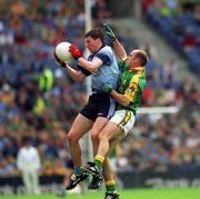 23 June 2002; Colin Moran of Dublin is tackled by Paddy Reynolds of Meath during the Bank of Ireland Leinster Senior Football Championship Semi-Final match between Dublin and Meath at Croke Park in Dublin. Photo by Ray McManus/Sportsfile