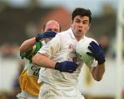 22 June 2002; Martin Lynch of Kildare in action against John Kenny of Offaly during the Bank of Ireland Leinster Senior Football Championship Semi-Final Replay match between Kildare and Offaly at Nowlan Park in Kilkenny. Photo by Brendan Moran/Sportsfile