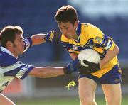 22 June 2002; Michael O'Dwyer of Clare in action against Damien Ryan of Laois during the Bank of Ireland All-Ireland Senior Football Championship Qualifying Round 2 match between Laois and Clare at O'Moore Park in Portlaoise, Laois. Photo by Aoife Rice/Sportsfile