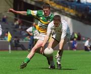 23 June 2002; Brian Graven of Kildare in action against Eddie Greene of Offaly during the Bank of Ireland Leinster Junior Football Championship Semi-Final match between Offaly and Kildare at Croke Park in Dublin. Photo by Pat Murphy/Sportsfile