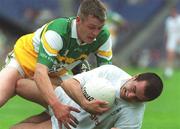 23 June 2002; Damien Behan of Kildare in action against Niall McEvoy of Offaly during the Bank of Ireland Leinster Junior Football Championship Semi-Final match between Offaly and Kildare at Croke Park in Dublin. Photo by Pat Murphy/Sportsfile