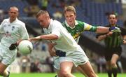 23 June 2002; Eamonn McCormack of Kildare in action against Offaly's Willie Stynes during the Bank of Ireland Leinster Junior Football Championship Semi-Final match between Offaly and Kildare at Croke Park in Dublin. Photo by Pat Murphy/Sportsfile