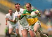 23 June 2002; Ross Evans of Offaly in action against Jarlath Gilroy of Kildare during the Bank of Ireland Leinster Junior Football Championship Semi-Final match between Offaly and Kildare at Croke Park in Dublin. Photo by Damien Eagers/Sportsfile