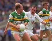 23 June 2002; Ross Evans of Offaly in action against John Casey of Kildare during the Bank of Ireland Leinster Junior Football Championship Semi-Final match between Offaly and Kildare at Croke Park in Dublin. Photo by Brian Lawless/Sportsfile