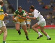 23 June 2002; Tom Cramptons of Offaly in action against Kildare's Pauric Kelly during the Bank of Ireland Leinster Junior Football Championship Semi-Final match between Offaly and Kildare at Croke Park in Dublin. Photo by Brian Lawless/Sportsfile