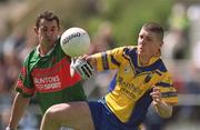 23 June 2002; Seamus O'Neill of Roscommon in action against Mayo's Shane Trench during the Bank of Ireland All-Ireland Senior Football Championship Qualifier Round 2 between Mayo and Roscommon at MacHale Park in Castlebar, Mayo. Photo by David Maher/Sportsfile