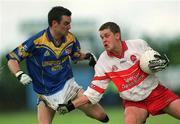 23 June 2002; Gavin Diamond of Derry in action against Longford's Shane Carroll during the Bank of Ireland All-Ireland Senior Football Championship Qualifier Round 2 match between Longford and Derry at Pearse Park in Longford. Photo by Aoife Rice/Sportsfile