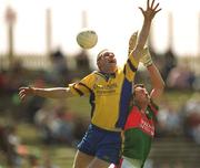23 June 2002; Seamus O'Neill of Roscommon in action against Mayo's Colm McManaman during the Bank of Ireland All-Ireland Senior Football Championship Qualifier Round 2 between Mayo and Roscommon at MacHale Park in Castlebar, Mayo. Photo by David Maher/Sportsfile