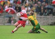 16 June 2002; Gareth Doherty of Derry in action against Paul McGonigle of Donegal during the Bank of Ireland Ulster Senior Football Championship Semi-Final match between Donegal and Derry at St TiernachÕs Park in Clones, Monaghan. Photo by Damien Eagers/Sportsfile