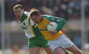 14 April 2002; Donal Curtis of Meath is tackled by Seamus Moynihan of Kerry during the Allianz National Football League Division 2 Semi-Final match between Meath and Kerry at the Gaelic Grounds in Limerick. Photo by Matt Browne/Sportsfile