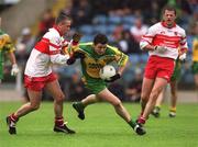 16 June 2002; Christy Toye of Donegal in action against Ciaran McNally of Derry during the Bank of Ireland Ulster Senior Football Championship Semi-Final match between Donegal and Derry at St TiernachÕs Park in Clones, Monaghan. Photo by Damien Eagers/Sportsfile