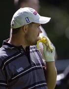 26 June 2002; Padraig Harrington of Ireland takes a break with a banana during the Pro-Am round ahead of the Murphy's Irish Open at Fota Island Resort Golf Club in Cork. Photo by Damien Eagers/Sportsfile