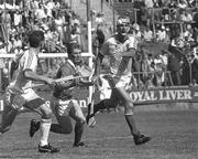 2 July 1989; Ger Fitzpatrick of Waterford in action against Tipperary's Declan Ryan during the Munster Senior Hurling Championship Final match between Tipperary and Waterford at Pairc Ui Chaoimh in Cork. Photo by Ray McManus/Sportsfile