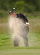 27 June 2002; Adam Scott of Australia chips out of a bunker at the fifth green during day one of the Murphy's Irish Open at Fota Island Resort Golf Club in Cork. Photo by Damien Eagers/Sportsfile