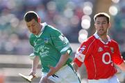 29 June 2002; Ciaran Carey of Limerick in action against Cork's Alan Cummins during the Guinness All-Ireland Senior Hurling Championship Qualifying Round 1 match between Cork and Limerick at Semple Stadium in Thurles, Tipperary. Photo by Brendan Moran/Sportsfile