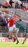 29 June 2002; Derek Barrett and John Gardiner of Cork in action against Peter Lawlor of Limerick during the Guinness All-Ireland Senior Hurling Championship Qualifying Round 1 match between Cork and Limerick at Semple Stadium in Thurles, Tipperary. Photo by Brendan Moran/Sportsfile