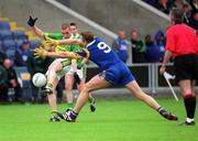 30 June 2002; Sean O'Sullivan of Kerry is tackled by Wicklow's Fergus Daly during the Bank of Ireland All-Ireland Senior Football Championship Qualifying Round 2 match between Kerry and Wicklow at O'Moore Park in Portlaoise, Laois. Photo by Aoife Rice/Sportsfile