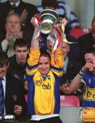 30 June 2002; Patrick McCormack of Tipperary lifts the cup following his side's victory during the Munster Minor Hurling Championship Final match between Cork and Tipperary at Páirc U’ Chaoimh in Cork. Photo by Brendan Moran/Sportsfile
