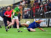 30 June 2002; Michael Francis Russell of Kerry is tackled by Wicklow's Brendan OhAnnaidh during the Bank of Ireland All-Ireland Senior Football Championship Qualifying Round 2 match between Kerry and Wicklow at O'Moore Park in Portlaoise, Laois. Photo by Aoife Rice/Sportsfile