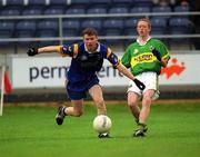 30 June 2002; Colm Cooper of Kerry in action against Wicklow's Thomas Burke during the Bank of Ireland All-Ireland Senior Football Championship Qualifying Round 2 match between Kerry and Wicklow at O'Moore Park in Portlaoise, Laois. Photo by Aoife Rice/Sportsfile