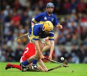 30 June 2002; Trevor Ivors of Tipperary in action against PJ Copse of Cork during the Munster Minor Hurling Championship Final match between Cork and Tipperary at Páirc U’ Chaoimh in Cork. Photo by Ray McManus/Sportsfile
