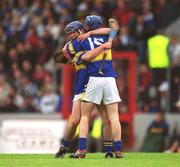 30 June 2002; Tipperary's Trevor Ivors, right, and team-mate Conor O'Brien celebrate following their side's victory during the Munster Minor Hurling Championship Final match between Cork and Tipperary at Páirc U’ Chaoimh in Cork. Photo by Ray McManus/Sportsfile