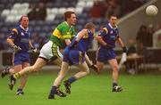 30 June 2002; Noel Kennelly of Kerry in action against Barry O'Donovan of Wicklow during the Bank of Ireland All-Ireland Senior Football Championship Qualifying Round 2 match between Kerry and Wicklow at O'Moore Park in Portlaoise, Laois. Photo by Aoife Rice/Sportsfile
