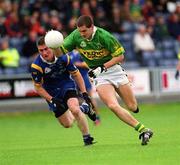 30 June 2002; Eoin Brosnan of Kerry in action against Garry Jameson of Wicklow during the Bank of Ireland All-Ireland Senior Football Championship Qualifying Round 2 match between Kerry and Wicklow at O'Moore Park in Portlaoise, Laois. Photo by Aoife Rice/Sportsfile