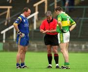 30 June 2002; Referee Michael McGrath with captains Darragh î SŽ of Kerry, right, and Brendan O hAnnaidh of Wicklow during the coin toss prior to the Bank of Ireland All-Ireland Senior Football Championship Qualifying Round 2 match between Kerry and Wicklow at O'Moore Park in Portlaoise, Laois. Photo by Aoife Rice/Sportsfile