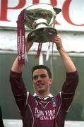 30 June 2002; Galway captain Padraig Joyce lifts the Nestor Cup following his side's victory during the Bank of Ireland Connacht Senior Football Championship Final match between Galway and Sligo at MacHale Park in Castlebar, Mayo. Photo by David Maher/Sportsfile