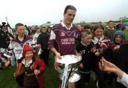 30 June 2002; Galway captain Padraig Joyce celebrates with supporters as he leaves the pitch holding the Nestor Cup following his side's victory during the Bank of Ireland Connacht Senior Football Championship Final match between Galway and Sligo at MacHale Park in Castlebar, Mayo. Photo by David Maher/Sportsfile