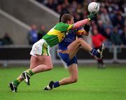 30 June 2002; Dara î CinnŽide of Kerry is tackled by Wicklow's Colm Toomey during the Bank of Ireland All-Ireland Senior Football Championship Qualifying Round 2 match between Kerry and Wicklow at O'Moore Park in Portlaoise, Laois. Photo by Aoife Rice/Sportsfile
