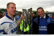 30 June 2002; Waterford manager Justin McCarthy, right, and corner back Brian Flannery celebrate with the trophy after the game. Waterford v Tipperary, Guinness Munster Hurling Final, Pairc Ui Chaoimh, Cork. Picture credit; Brendan Moran / SPORTSFILE
