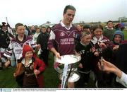 30 June 2002; Galway captain Padraig Joyce celebrates with fans as his leaves the pitch holding the Nestor Cup after victory over Sligo. Galway v Sligo, Connacht Senior Football Championship Final, McHale Park, Castlebar, Mayo. Picture credit; David Maher / SPORTSFILE