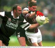30 June 2002; Paul Clancy, Galway, holds off the challenge from Sligo's Paul Durkan and Patrick Naughton. Galway v Sligo, Connacht Senior Football Championship Final, McHale Park, Castlebar, Mayo. Picture credit; David Maher / SPORTSFILE