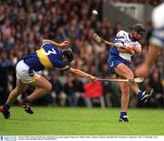 30 June 2002; Seamus Prendergast, Waterford, in action against Tipperary's Philip Maher. Guinness Munster Hurling Final, Waterford v Tipperary, Pairc Ui Chaoimh, Cork.  Picture credit; Brendan Moran / SPORTSFILE