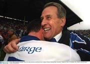 30 June 2002; Waterford manager Justin McCarthy celebrates with Brian Green. Guinness Munster Hurling Final, Waterford v Tipperary, Pairc Ui Chaoimh, Cork.  Picture credit; Brendan Moran / SPORTSFILE