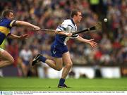 30 June 2002; Eoin Kelly, Waterford, in action against Tipperary's Conor Gleeson. Guinness Munster Hurling Final, Waterford v Tipperary, Pairc Ui Chaoimh, Cork.  Picture credit; Ray McManus / SPORTSFILE