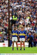 30 June 2002; Tipperary midfielders Thomas Dunne, left, and Noel Morris stand for the National Anthem before the game. Waterford v Tipperary, Guinness Munster Hurling Final, Pairc Ui Chaoimh, Cork. Picture credit; Brendan Moran / SPORTSFILE