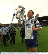 30 June 2002; Waterford's Ken McGrath celebrates with the cup after defeating Tipperary. Waterford v Tipperary, Guinness Munster Hurling Final, Pairc Ui Chaoimh, Cork. Picture credit; Brendan Moran / SPORTSFILE