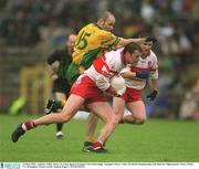 16 June 2002; Anthony Tohill, Derry, in action against Donegal's Paul McGonigle. Donegal v Derry, Ulster Football Championship semi-final, St. Tighearnach's Park, Clones, Co. Monaghan. Picture credit; Damien Eagers / SPORTSFILE
