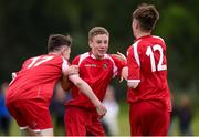 16 June 2017; Cian McHale of Mayo celebrates after scoring a goal against Kilkenny with team-mates Ryan Fadden ,left, and Sean Niland during the SFAI Umbro Kennedy Cup Trophy Final match between Mayo and Kilkenny at the University of Limerick in Limerick. Photo by Matt Browne/Sportsfile